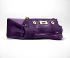 Maya midi in purple galapagos leather flat on the studio floor open