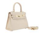 Beige Italian leather handbag with gold hardware and a detachable strap on a white background