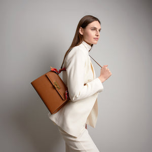 Luxury leather handbag with detachable shoulder strap