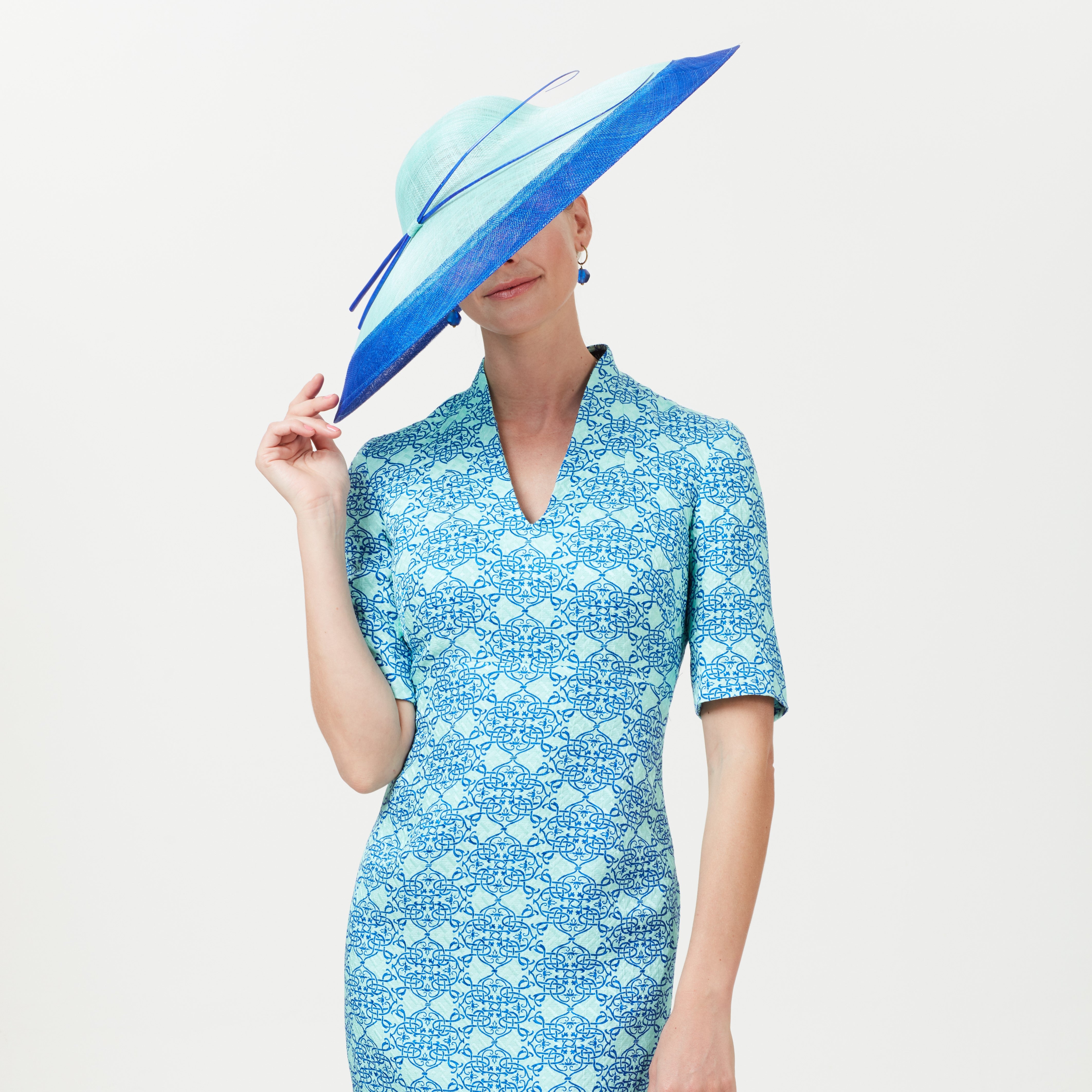 Shift dress for wedding guest in aqua blue with hat