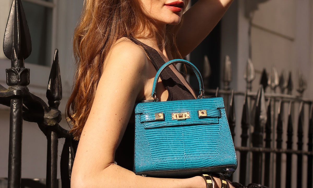 files/Handbagholic-Lalage-Beaumont-bestselling-affordable-luxury-handbags-maya-midi-galapagos-teal.jpg