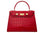 A large red, ‘croc’ print Italian calf leather handbag with top handle, detachable strap and gold plated hardware.