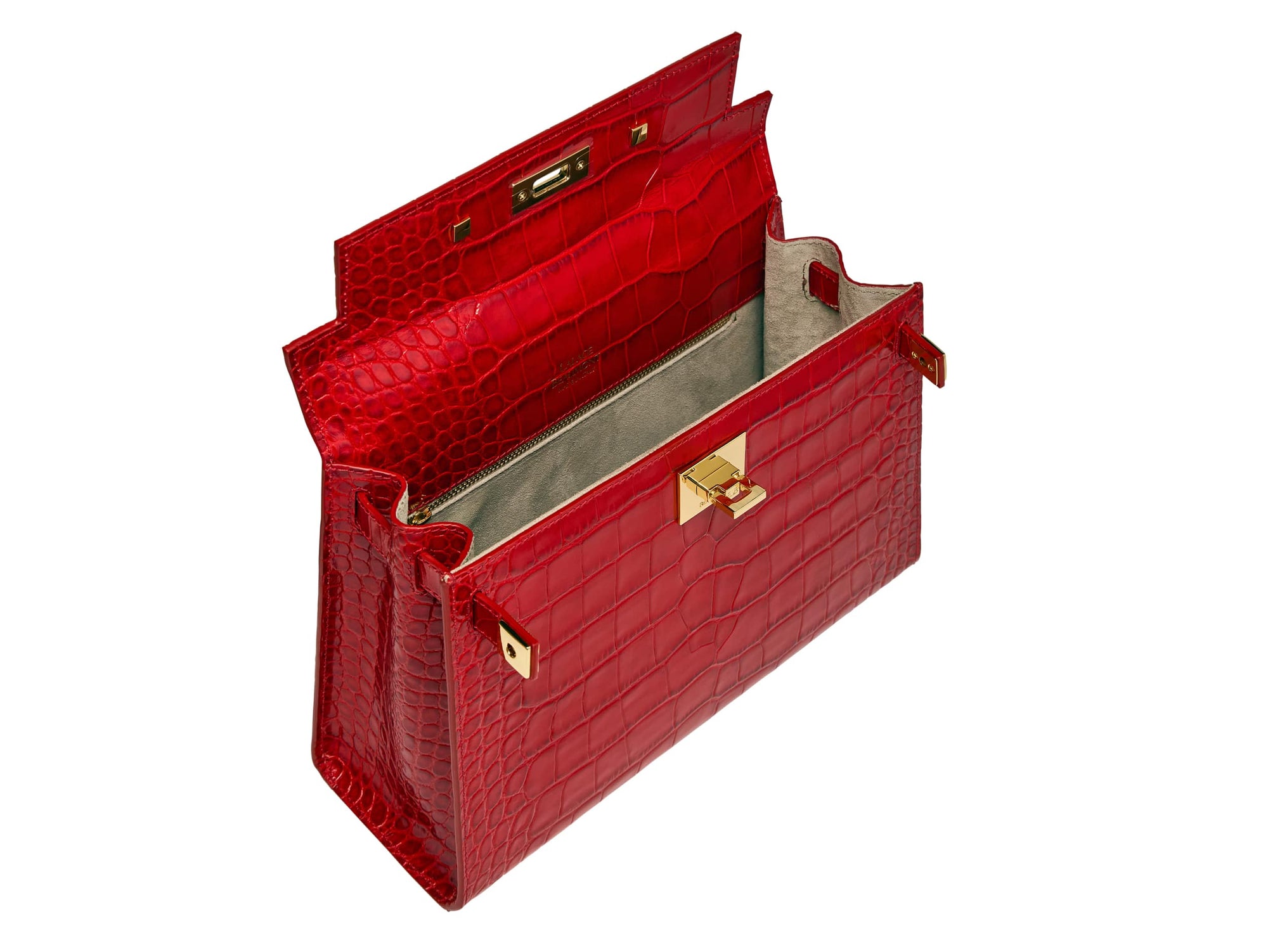 Inside of a large red, ‘croc’ print Italian calf leather handbag with top handle, detachable strap and gold plated hardware showing grey suede lined interior.