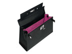 Inside a black Maya Large Italian leather handbag with a pebble print, featuring a top handle, detachable strap and silver colored hardware showing the dark pink suede lined interior.
