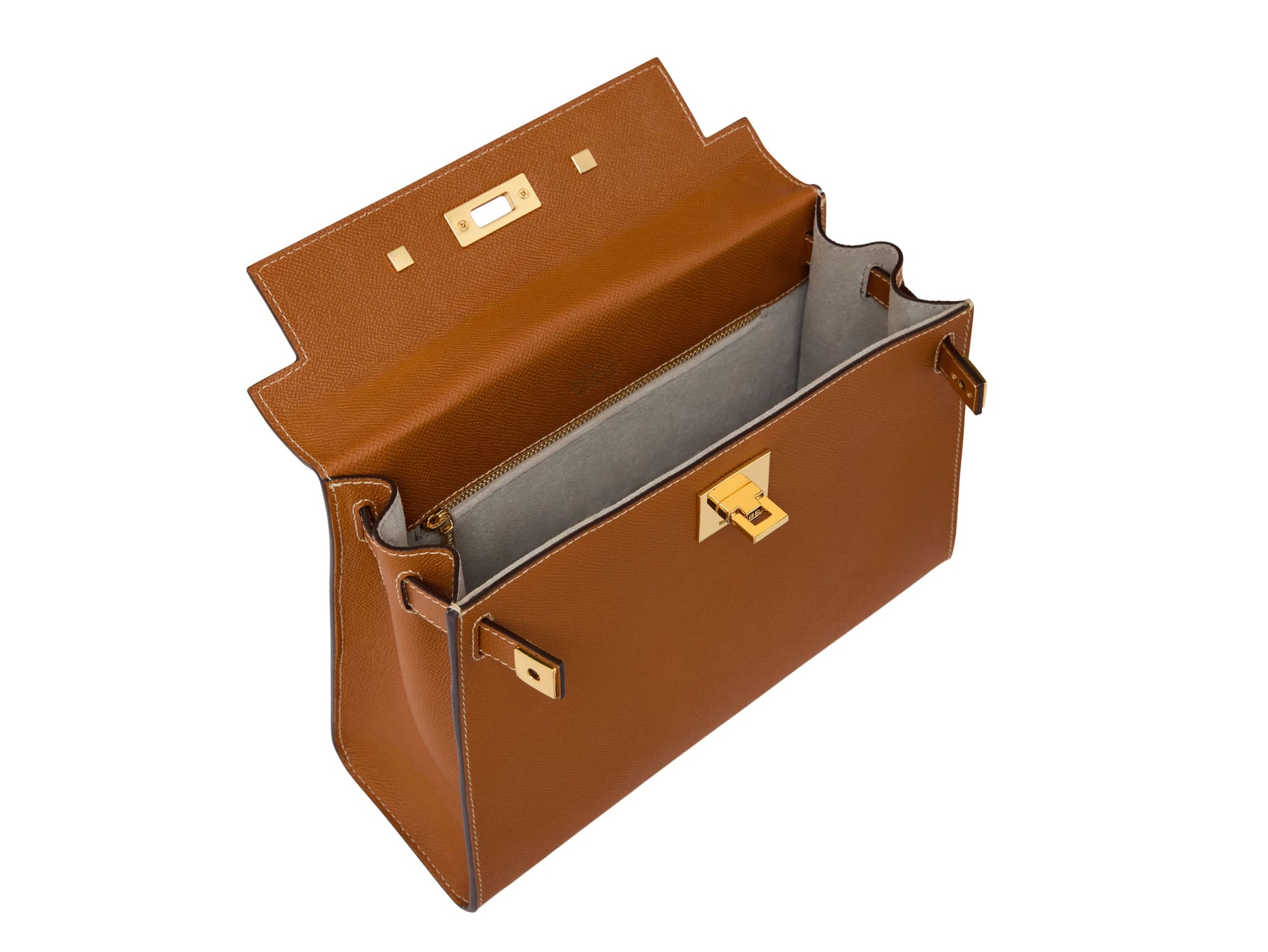 Inside of a large tan pebble print Italian calf leather handbag with top handle, detachable strap and gold plated hardware