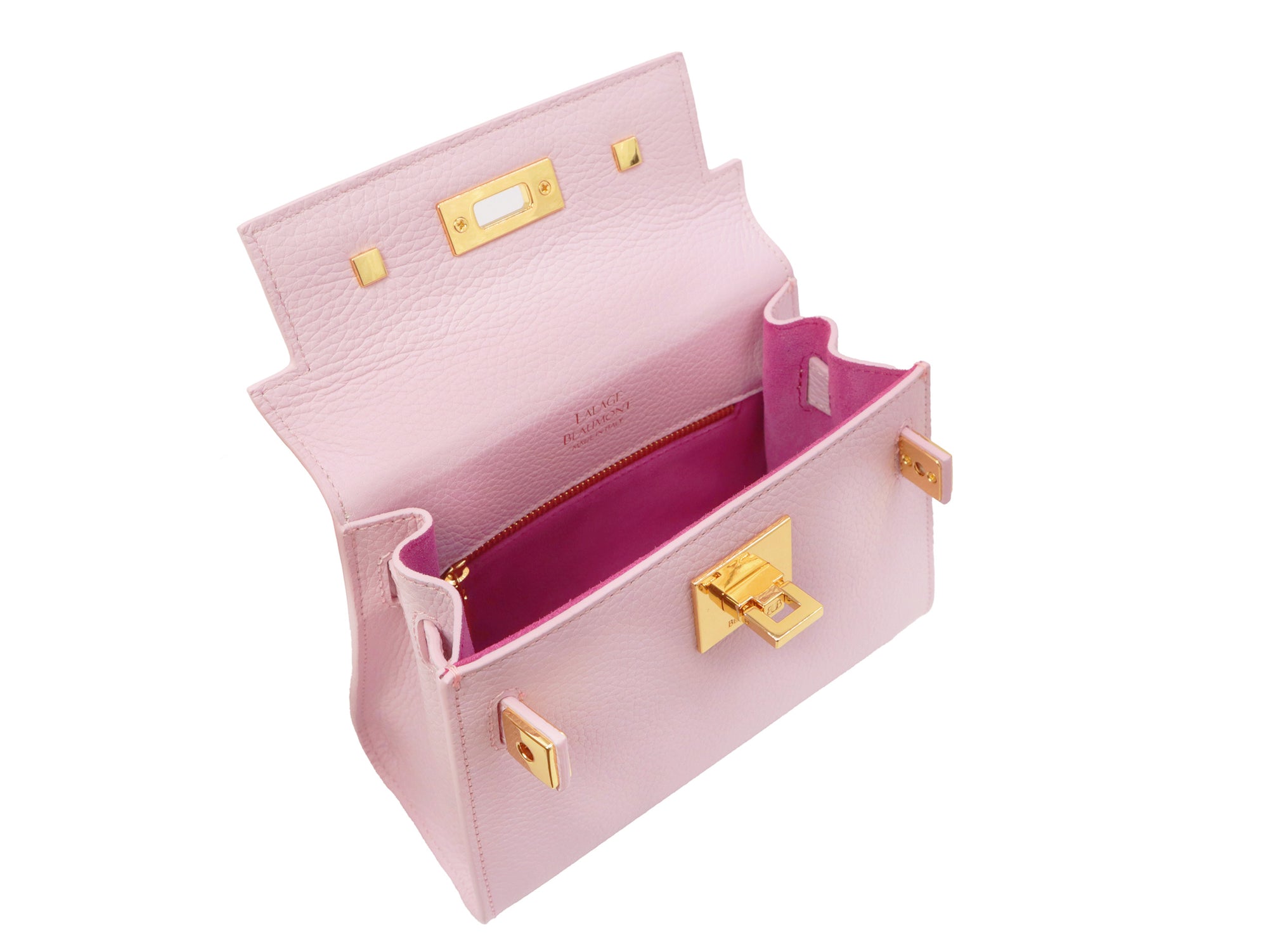 Inside of a pale pink, medium-sized, grainy print Italian calf leather handbag with gold-plated hardware, detachable strap and a top handle featuring a dark pink suede interior