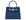 Royal blue Italian leather handbag with gold hardware, a top handle and a detachable strap on a white background