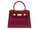 Red ‘lizard’ print Italian leather handbag with gold accents on a white background