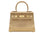 Medium gold natural grain Italian leather handbag with gold hardware, a top handle and a detachable strap on a white background